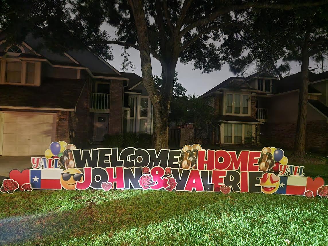 Custom Welcome Home yard sign rental in Katy TX with large colorful letters and lawn display
