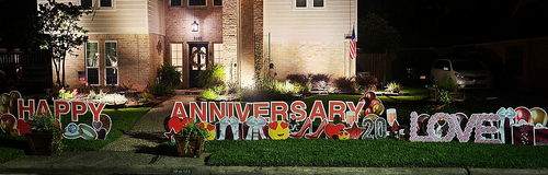 Custom Anniversary yard sign rental in Houston TX with large colorful letters and lawn display
